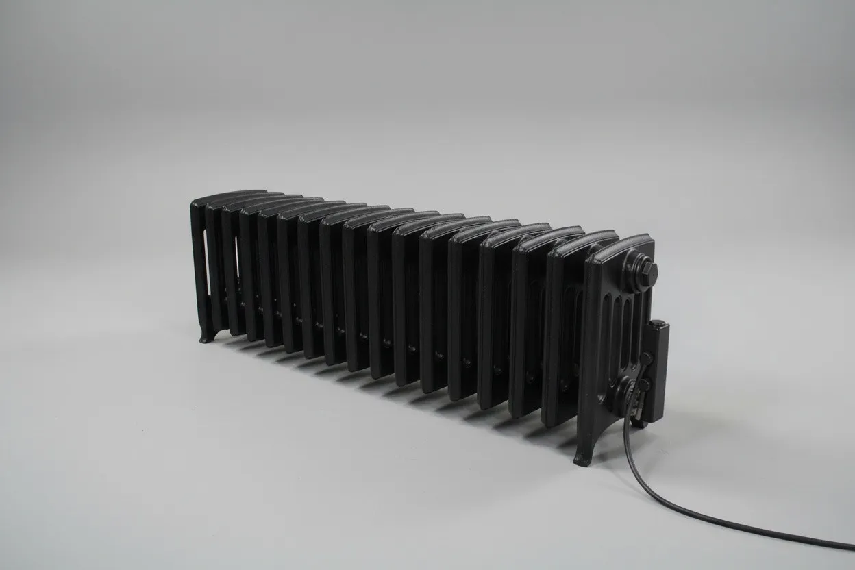 Radiateur en fonte noir de faible hauteur équipé d’une commande électrique latérale